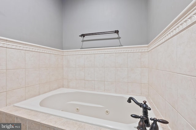 bathroom featuring tiled tub