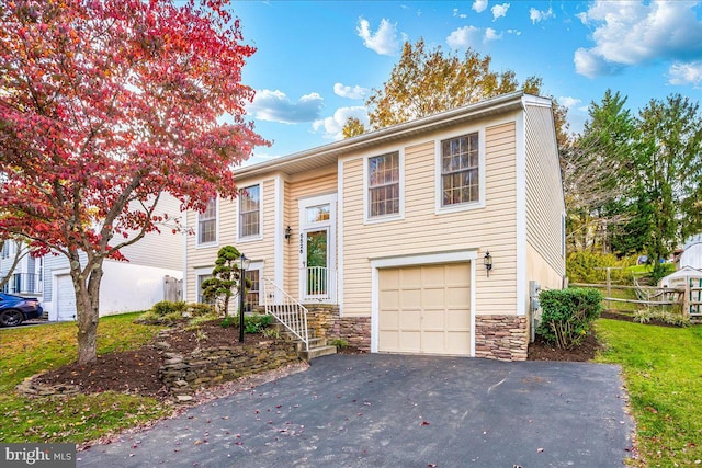 view of front of property featuring a garage