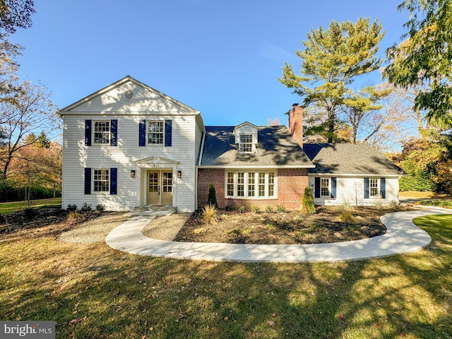 view of front of property with a front lawn