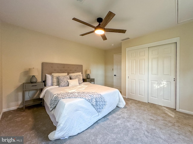 bedroom featuring a closet, dark carpet, and ceiling fan