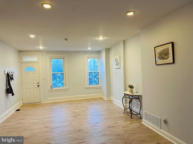 foyer with light hardwood / wood-style flooring