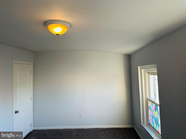 empty room with carpet flooring