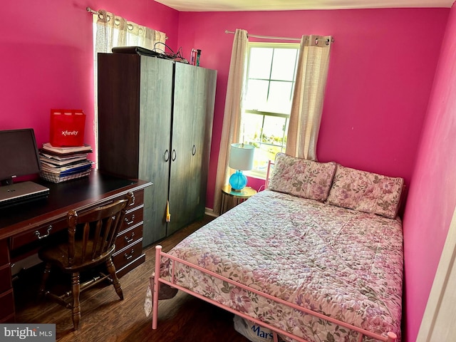 bedroom featuring hardwood / wood-style flooring