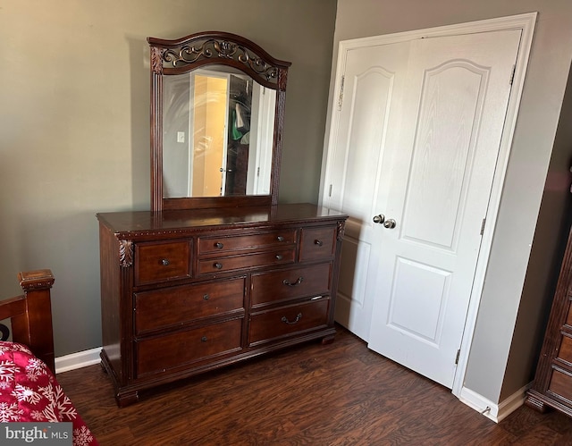 bedroom featuring dark hardwood / wood-style flooring