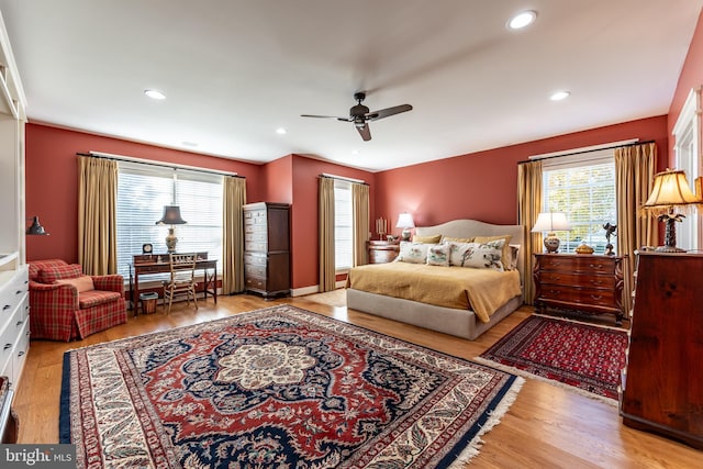 bedroom featuring recessed lighting, wood finished floors, and ceiling fan