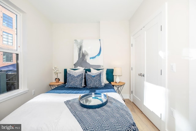 bedroom featuring light wood-type flooring