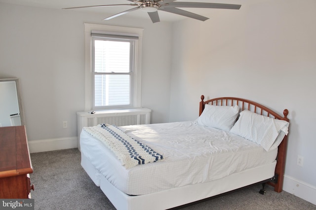 bedroom with ceiling fan and carpet floors