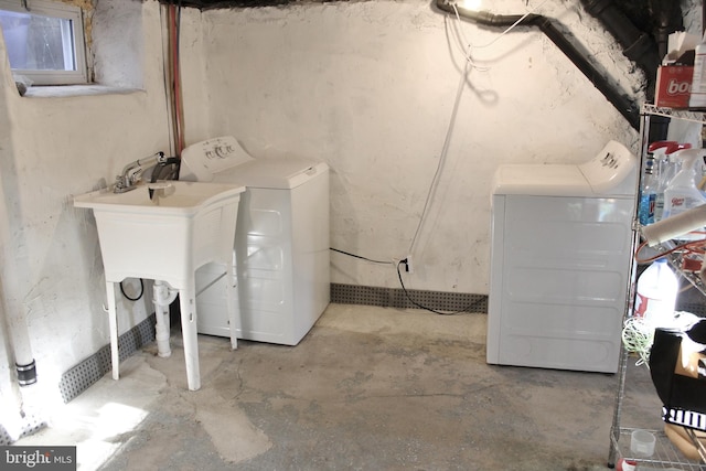 laundry room with independent washer and dryer