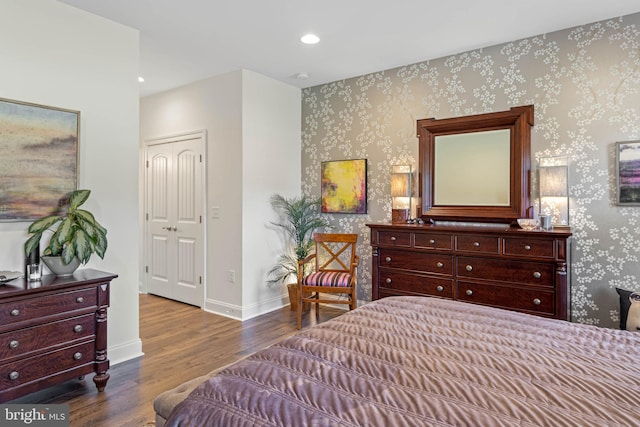 bedroom featuring a closet and wood-type flooring