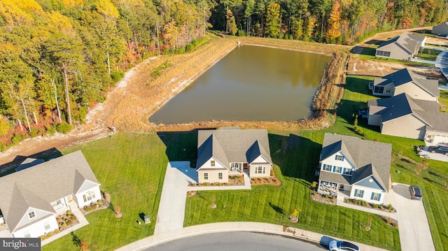 birds eye view of property featuring a water view