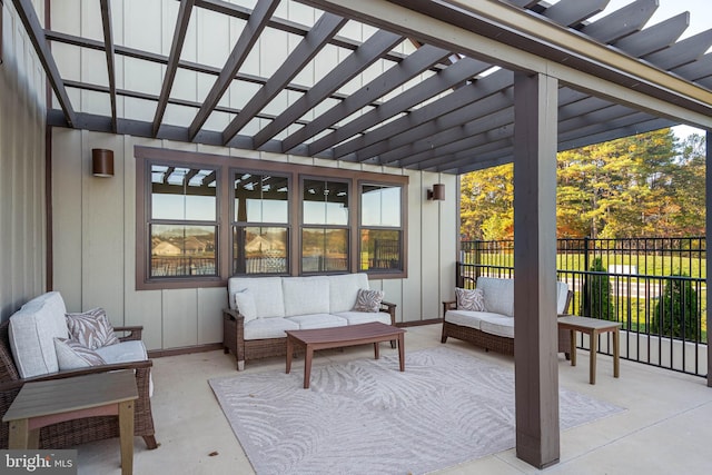 view of patio featuring outdoor lounge area and a pergola