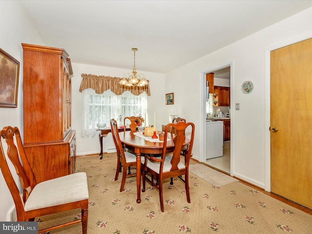 dining room featuring a chandelier