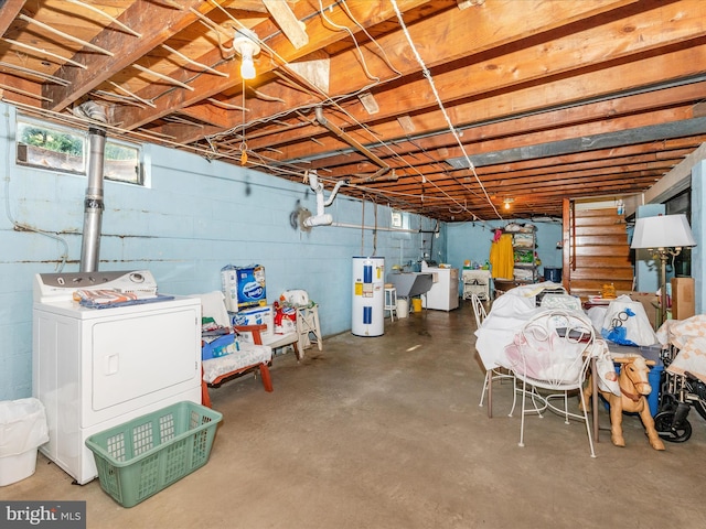 basement featuring washer / clothes dryer, sink, and electric water heater