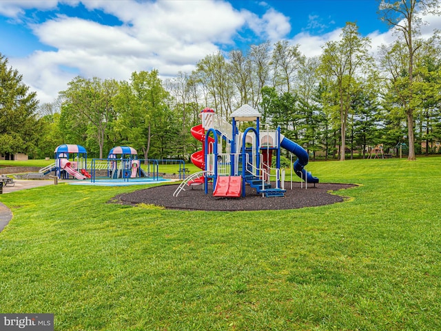 view of playground with a yard