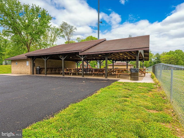 view of community featuring a gazebo and a yard