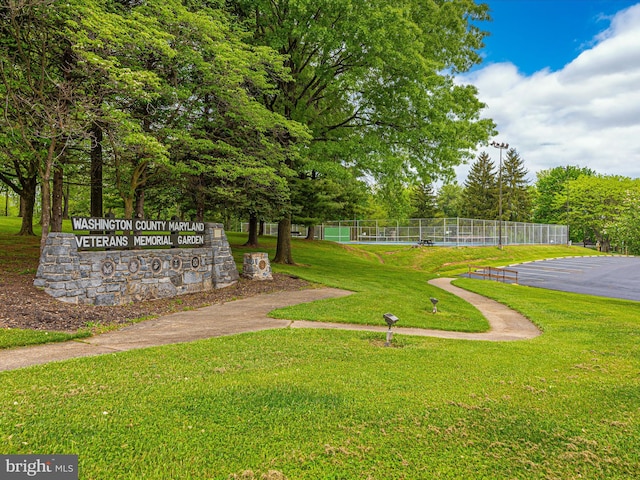 view of community featuring a yard