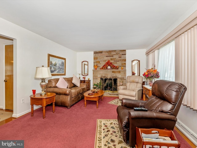 living room featuring carpet, baseboard heating, and a fireplace