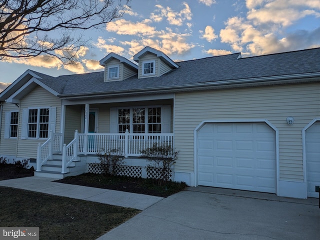 10281 Broken Sound Blvd, Ocean City, MD 21842 - view of front of property featuring a porch, an attached garage, driveway, and a shingled roof