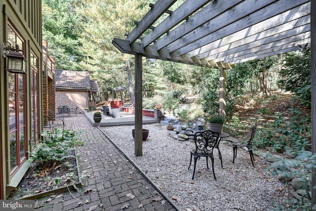 view of patio / terrace featuring a pergola