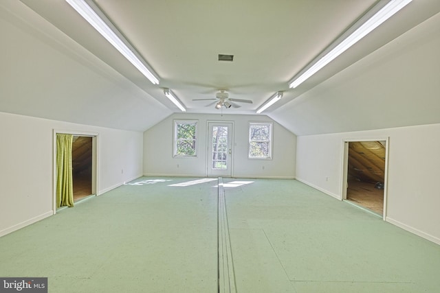 bonus room with vaulted ceiling and ceiling fan