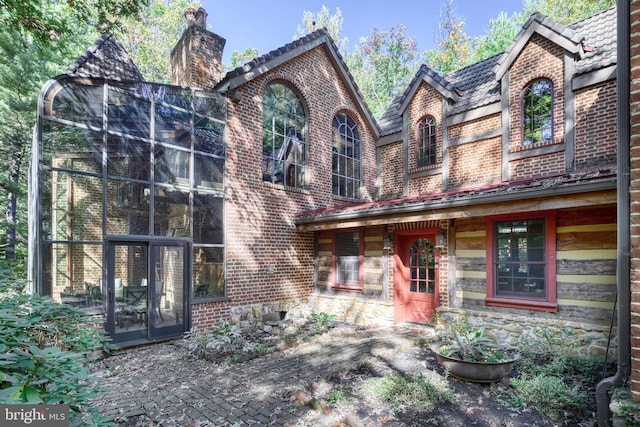995 Black Gap Rd, Fayetteville, PA 17222 - view of front facade featuring a chimney and brick siding
