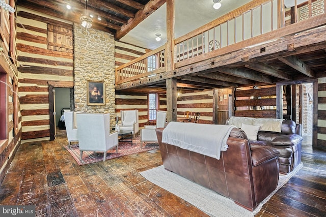 995 Black Gap Rd, Fayetteville, PA 17222 - living room featuring hardwood / wood-style flooring, wooden walls, and a towering ceiling