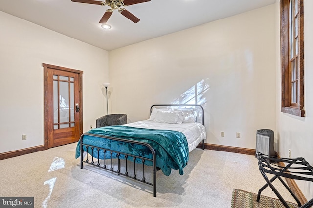 bedroom featuring ceiling fan and carpet flooring