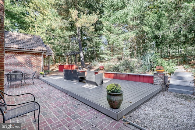 view of patio / terrace featuring a wooden deck