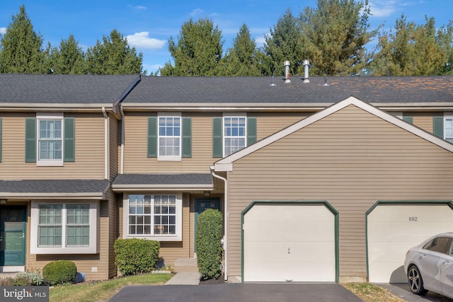 view of property featuring a garage