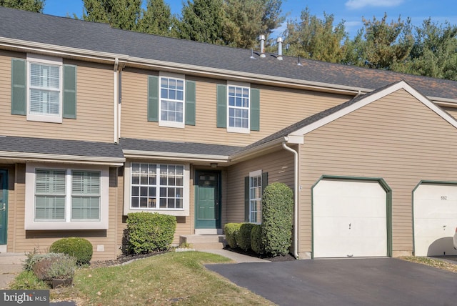 view of property with a garage