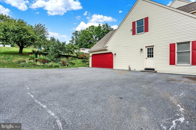 view of home's exterior featuring a garage