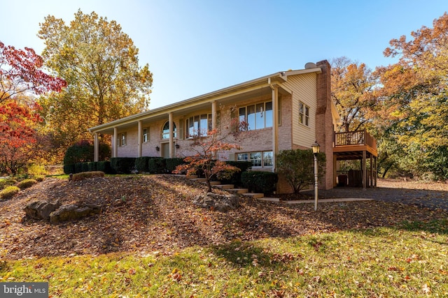 view of front of house featuring a deck