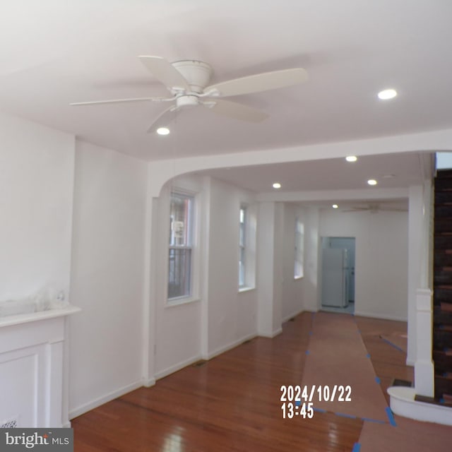 spare room featuring hardwood / wood-style flooring and ceiling fan