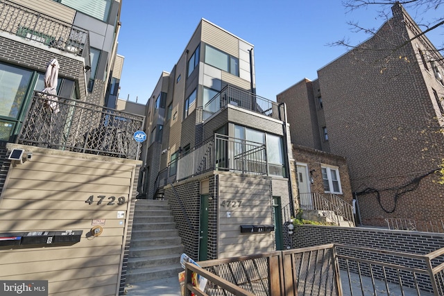 view of property with stairway