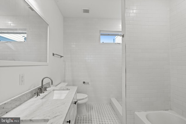 full bathroom with walk in shower, a bathing tub, toilet, a sink, and visible vents