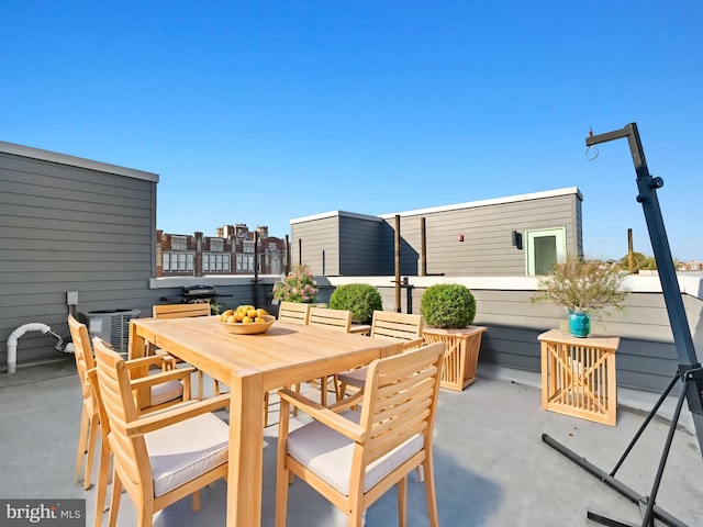 view of patio featuring outdoor dining area