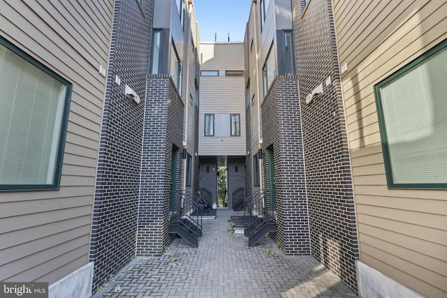 entrance to property featuring a patio