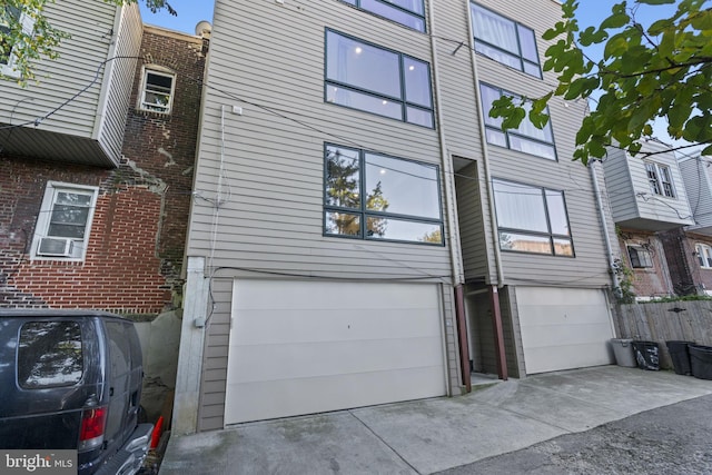 view of property exterior featuring a garage