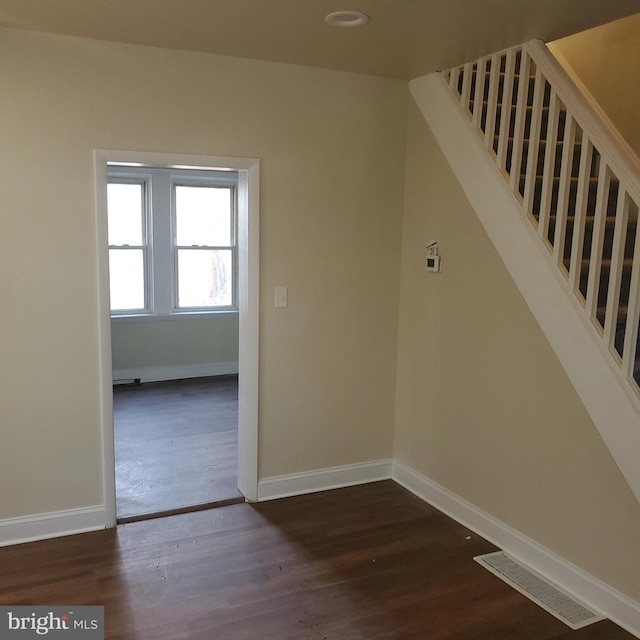 interior space with hardwood / wood-style flooring