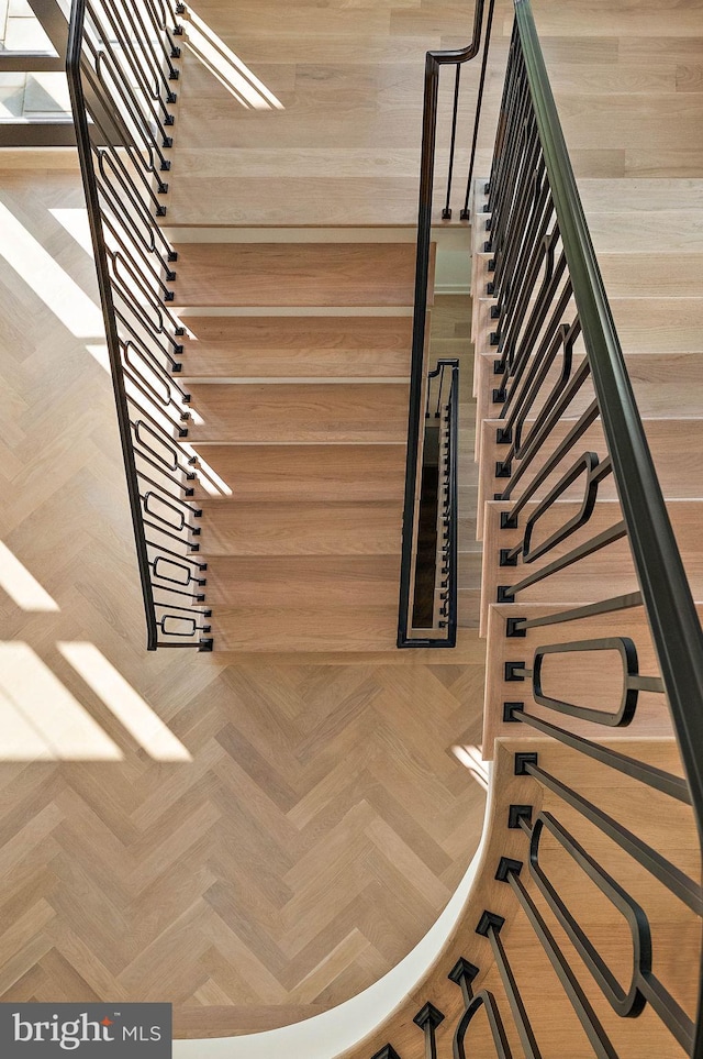 stairs with parquet flooring