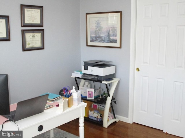 home office featuring dark wood-type flooring