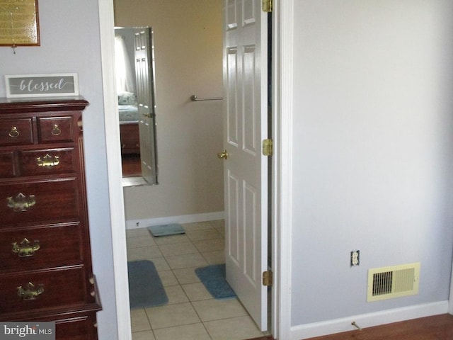 bathroom with tile patterned flooring