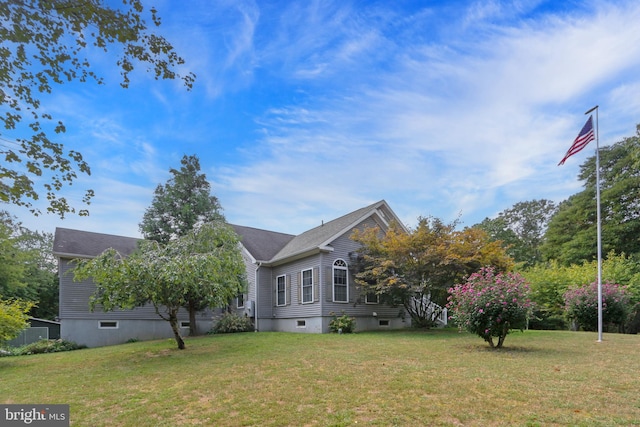 exterior space featuring a yard