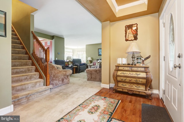 entryway with hardwood / wood-style flooring