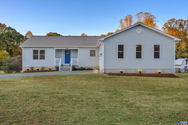 ranch-style house with a front yard