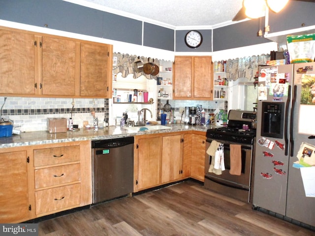 kitchen with a sink, stainless steel appliances, open shelves, dark wood-type flooring, and tasteful backsplash