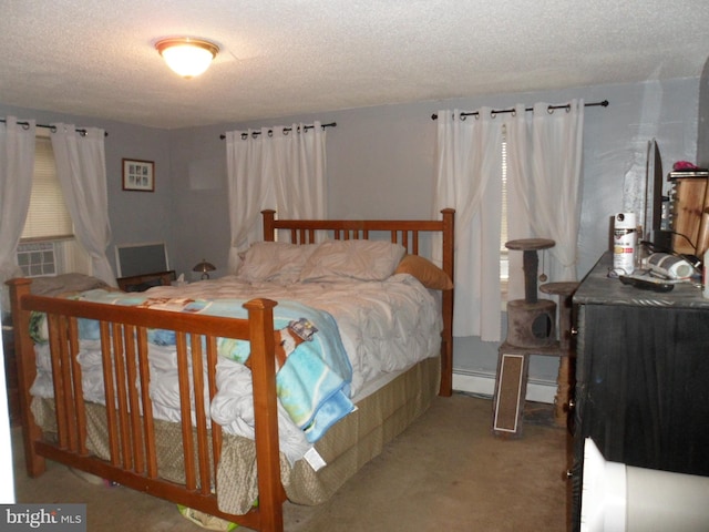 carpeted bedroom with a textured ceiling