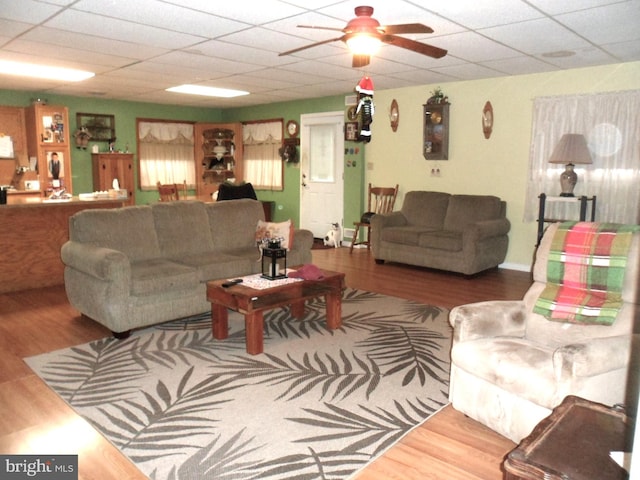 7548 Linglestown Rd, Harrisburg, PA 17112 - living room with wood finished floors, a paneled ceiling, and ceiling fan
