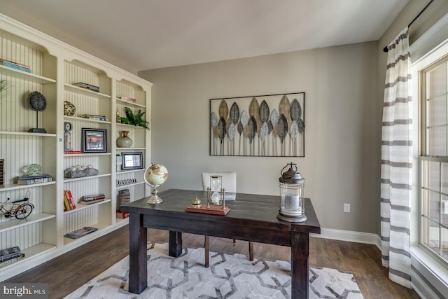 office space with hardwood / wood-style floors