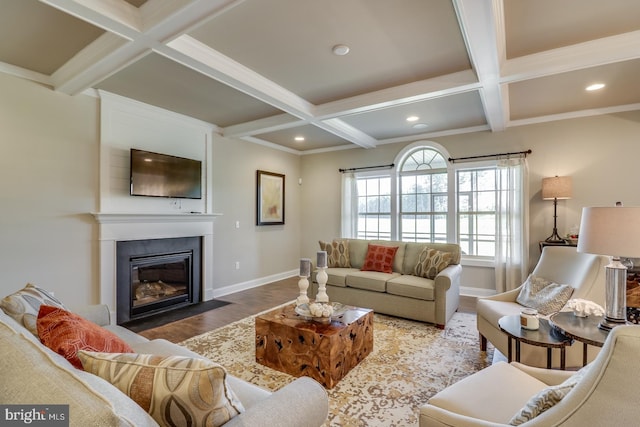 living room with coffered ceiling, beamed ceiling, wood-type flooring, and crown molding